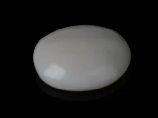 Buy a certified Australian fire opal 8.56 carat (9.41 ratti) online in India. This brilliant Natural Opal with play-of-color is from Ratna Gems. 100% lab-tested.