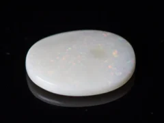 Side view of an Australian Fire Opal 8.56 Carat (9.41 Ratti)