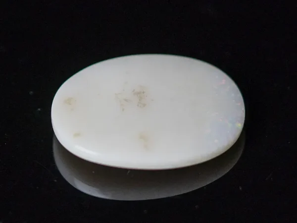 Back view of an 8.56 Carat (9.41 Ratti) natural opal gemstone