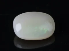 Side view of an Australian Fire Opal 9.46 Carat (10.39 Ratti)