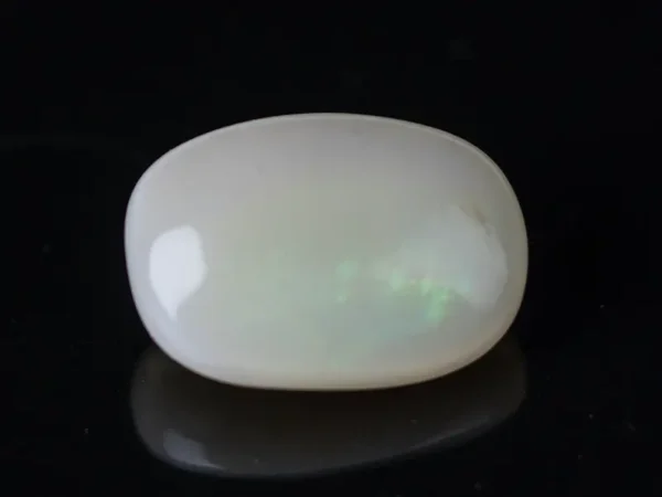 Side view of an Australian Fire Opal 9.46 Carat (10.39 Ratti)