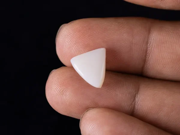 Wearing a 3.99 ratti triangle shukra ratna (Australian Opal)