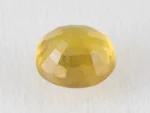 Back view of a 4.40 ratti natural pukhraj gemstone