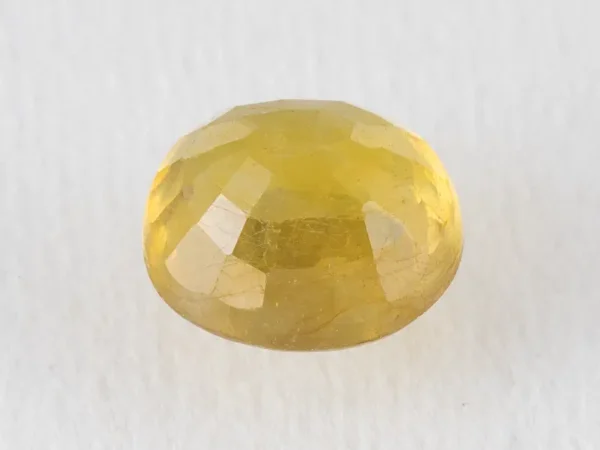Back view of a 4.40 ratti natural pukhraj gemstone