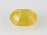 Back view of a 4.52 ratti natural yellow sapphire