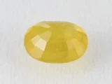 Back view of a 4.52 ratti natural yellow sapphire
