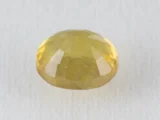 Back view of a 4.96 ratti natural yellow sapphire