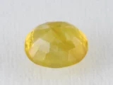 Back view of a 5.02 ratti natural yellow sapphire