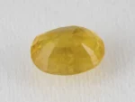 Back view of a 5.08 ratti natural pukhraj gemstone