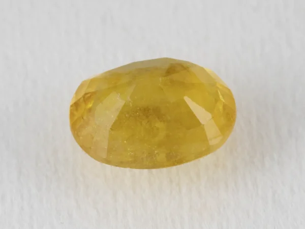 Back view of a 5.08 ratti natural pukhraj gemstone