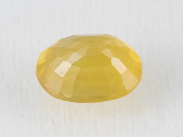 Back view of a 5.18 ratti natural pukhraj gemstone