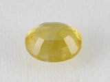 Back view of a 5.25 ratti natural yellow sapphire