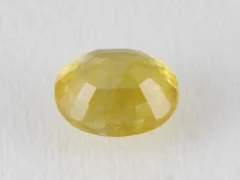 Back view of a 5.25 ratti natural yellow sapphire