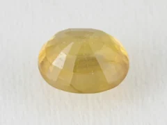 Back view of a 5.34 ratti natural yellow sapphire