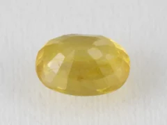 Back view of a 5.36 ratti natural yellow sapphire