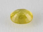 Back view of a 5.40 ratti natural pukhraj gemstone