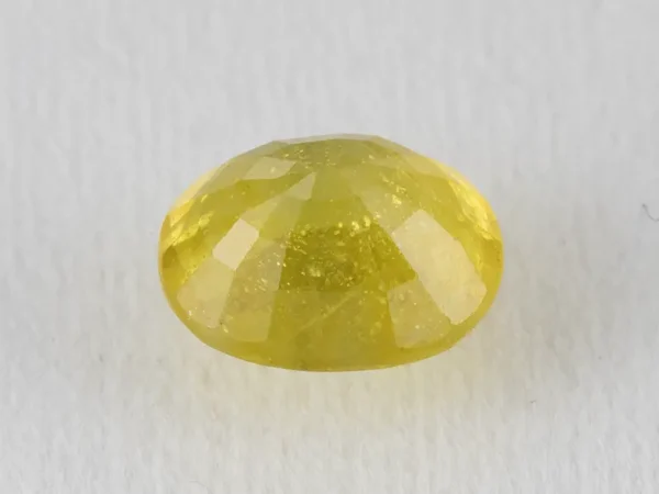 Back view of a 5.40 ratti natural pukhraj gemstone