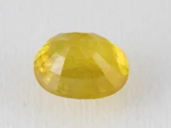 Back view of a 5.49 ratti natural yellow sapphire