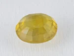 Back view of a 6.02 ratti natural yellow sapphire