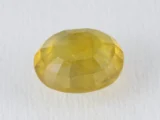 Back view of a 6.02 ratti natural yellow sapphire