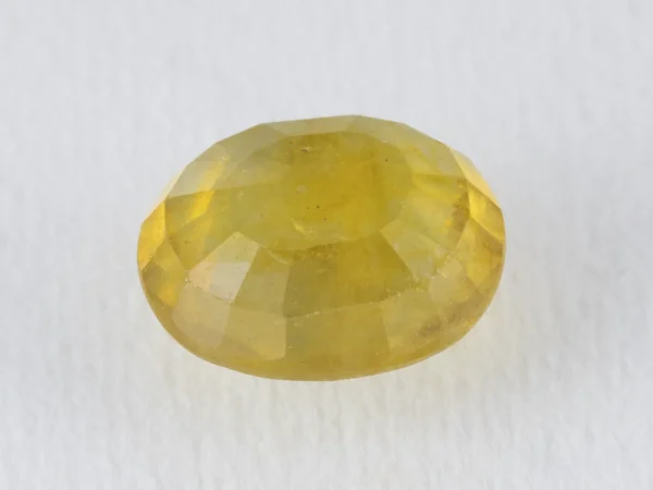 Back view of a 6.02 ratti natural yellow sapphire