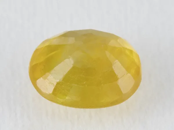 Back view of a 6.18 ratti natural yellow sapphire
