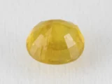 Back view of a 6.52 ratti natural pukhraj gemstone