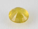 Back view of a 6.96 ratti natural yellow sapphire
