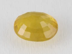 Back view of a 7.54 ratti natural pukhraj gemstone