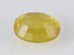 Back view of an 8.96 ratti natural yellow sapphire