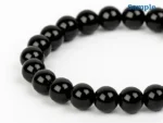 Side view of 8mm round black quartz beads bracelet