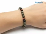 wearing a natural money magnet bracelet on wrist