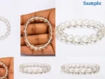 wearing a natural rock crystal bracelet on wrist