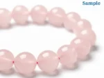 close-up of rose quartz bracelet beads