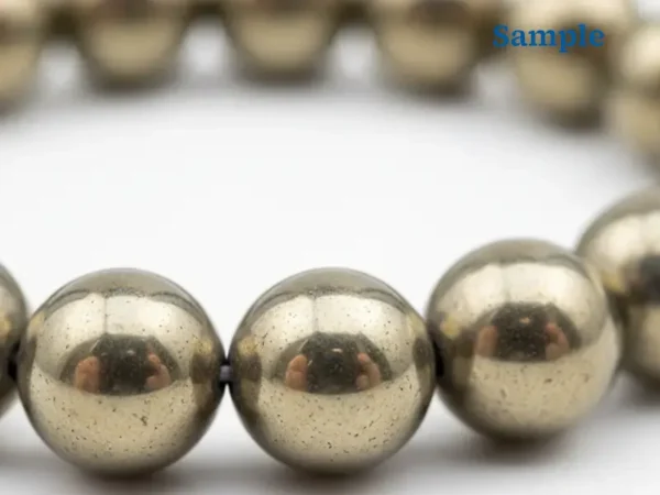 Close-up detail of natural golden pyrite beads
