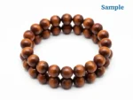 side profile of red tiger eye bracelet natural beads