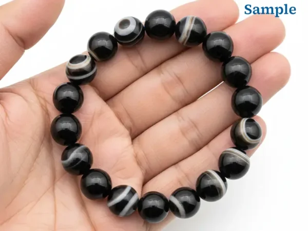 sulemani hakik bracelet held in palm for size reference