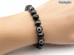 wearing sulemani hakik bracelet on wrist