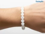 wearing a natural selenite bracelet on wrist