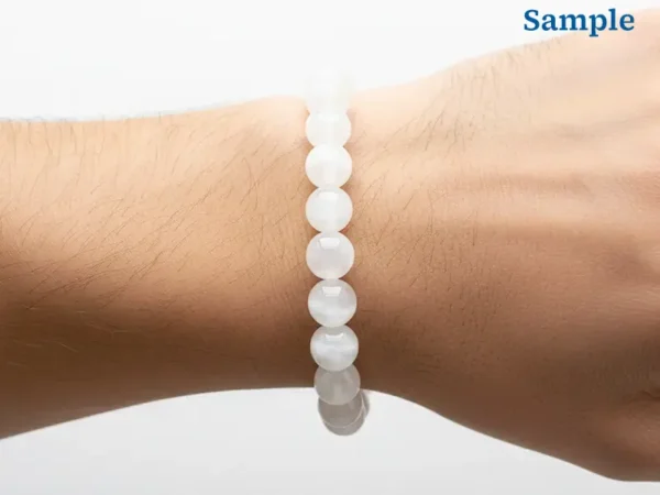 wearing a natural selenite bracelet on wrist