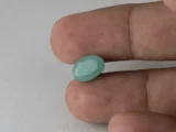 Brazilian Emerald 4 Carat (4.40 Ratti) Panna Stone in hand — Sapota, true scale and color
