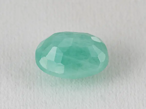 Brazilian Emerald 4.55 Carat (5.00 Ratti) Panna Stone — Sapota 2 Brazilian Emerald 4.55 Carat (5.00 Ratti) Panna Stone back view — Sapota, pavilion facets and symmetry