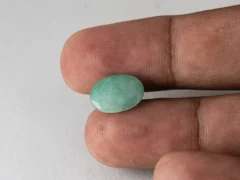 Brazilian Emerald 4.85 Carat (5.33 Ratti) Panna Stone - Sapota in hand for true scale and color