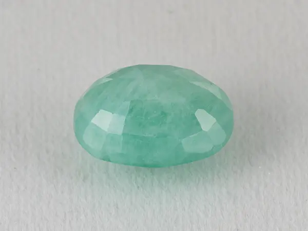 Brazilian Emerald 5.8 Carat (6.37 Ratti) Panna Stone — Sapota 3 Brazilian Emerald 5.8 Carat (6.37 Ratti) Panna Stone back view — Sapota, pavilion facets and symmetry