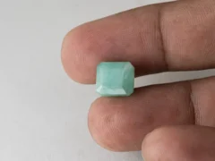 Brazilian Emerald 6.2 Carat (6.81 Ratti) Panna Stone in hand — Sapota, true scale and color
