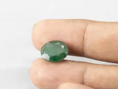 8.79 ratti Zambian Panna in hand for size reference