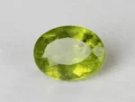 Peridot Stone 5.59 Carat (6.14 Ratti) top view in natural green Oval Mix Cut