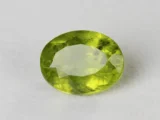 Peridot Stone 5.59 Carat (6.14 Ratti) top view in natural green Oval Mix Cut