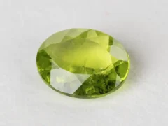Peridot Stone 5.94 Carat (6.53 Ratti) top view in natural green Oval Mix Cut