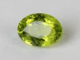 Peridot Stone 6.55 Carat (7.20 Ratti) top view in natural green Oval Mix Cut